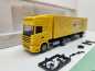 Preview: AWM H0 006734 MAN Sattelzug Deutsche Post Jahreswagen'02 / 1:87 / OVP
