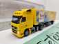 Preview: AWM H0 010499 Volvo Globetrotter Deutsche Post Jahreswg'04 / 1:87 / OVP