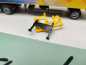 Preview: AWM H0 010499 Volvo Globetrotter Deutsche Post Jahreswg'04 / 1:87 / OVP