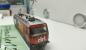 Preview: BEMO H0m DC 1259 122  RhB Ge4/4 III Nr. 652  Elektrische Neubaulokomotive / Werbelok "RIRI"OVP Analog