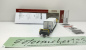 Preview: BEMO H0m DC 2289 115 Sbk-v 7705 mit Container "Casty Transporte" / RhB / OVP