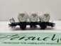Preview: Märklin H0 AC 48635 / zweiachsigen Behälter-Tragwagens der Bauart Lgns / DB AG