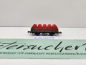 Preview: Minitrix N DC 51 1038 00 Mittelbordwagen / rote Fässer / Omm32 / DB