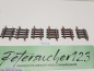 Preview: Märklin H0 AC 2235 5x gebogenes K-Gleis / R 424,6 / 3° 45'= 1/8 / Kleber, Farbe