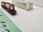 Preview: Mini Trix N DC 15257-1 / 4-achsigen Einheitstaschenwagen / Sdgkms 707 / DB AG / „BERTSCHI AG“ / OVP