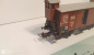 Preview: Trix H0 AC 23582 ged. Güterwagen m. Bremserhaus / NEM / DRG