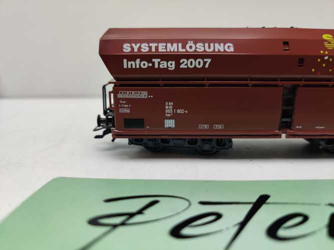 Roco H0 AC 47060 / vierachsiger Großraum-Selbstentladewagen /  Bauart Falns 159 / NEM / DB