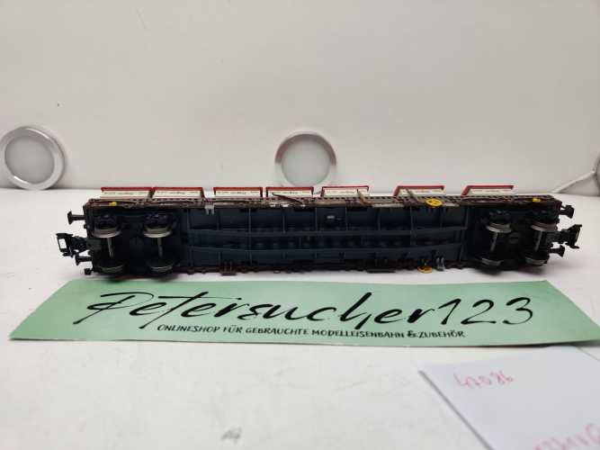 Märklin H0 AC 47086 vierachsigen Niederbordwagen der Bauart Rens 2 mit umklappbaren Rungen