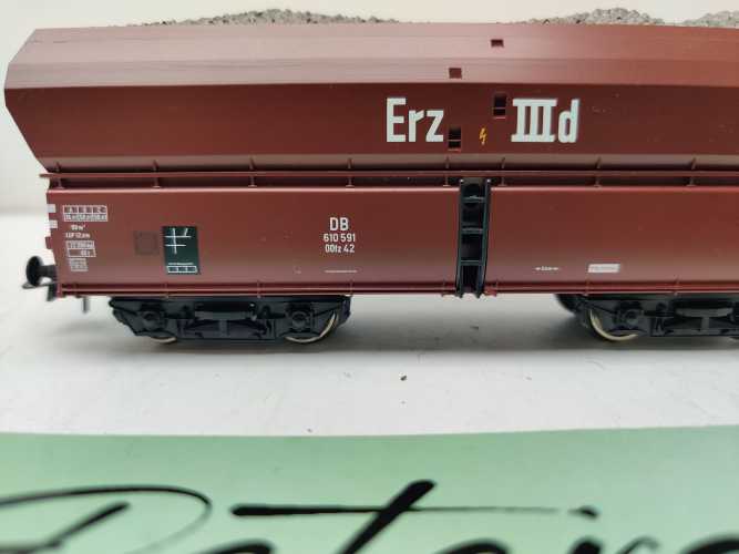 Roco H0 AC 610 591 / vierachsiger Großraum-Selbstentladewagen / NEM / DB / Ladegut Kohle