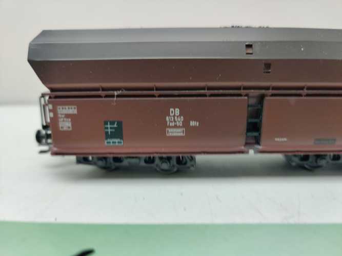 Roco H0 AC 614 540 / vierachsiger Großraum-Selbstentladewagen / NEM / DB / Ladegut Kohle