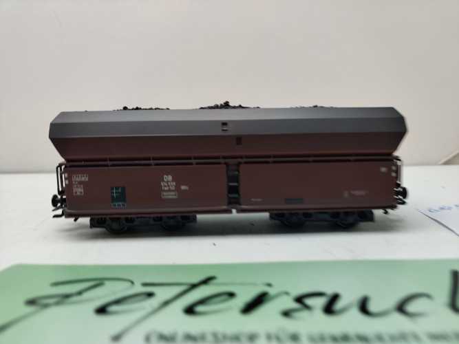Roco H0 AC 614 558 / vierachsiger Großraum-Selbstentladewagen / NEM / DB / Ladegut Kohle