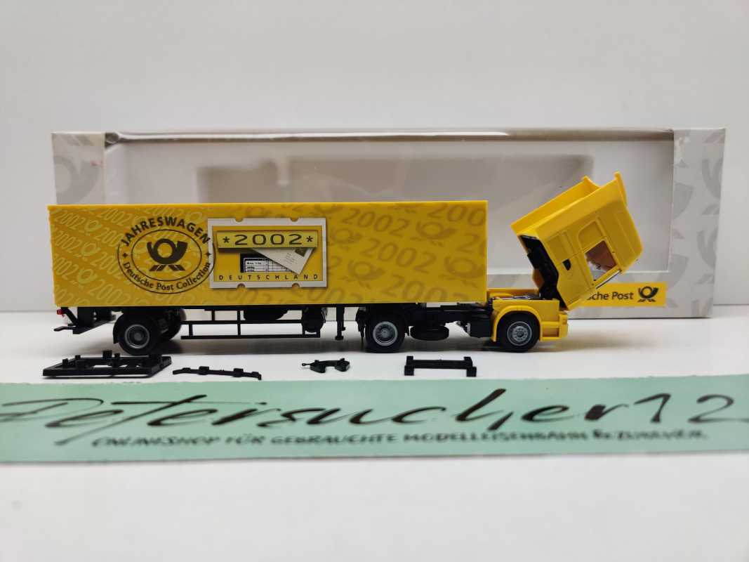 AWM H0 006734 MAN Sattelzug Deutsche Post Jahreswagen'02 / 1:87 / OVP