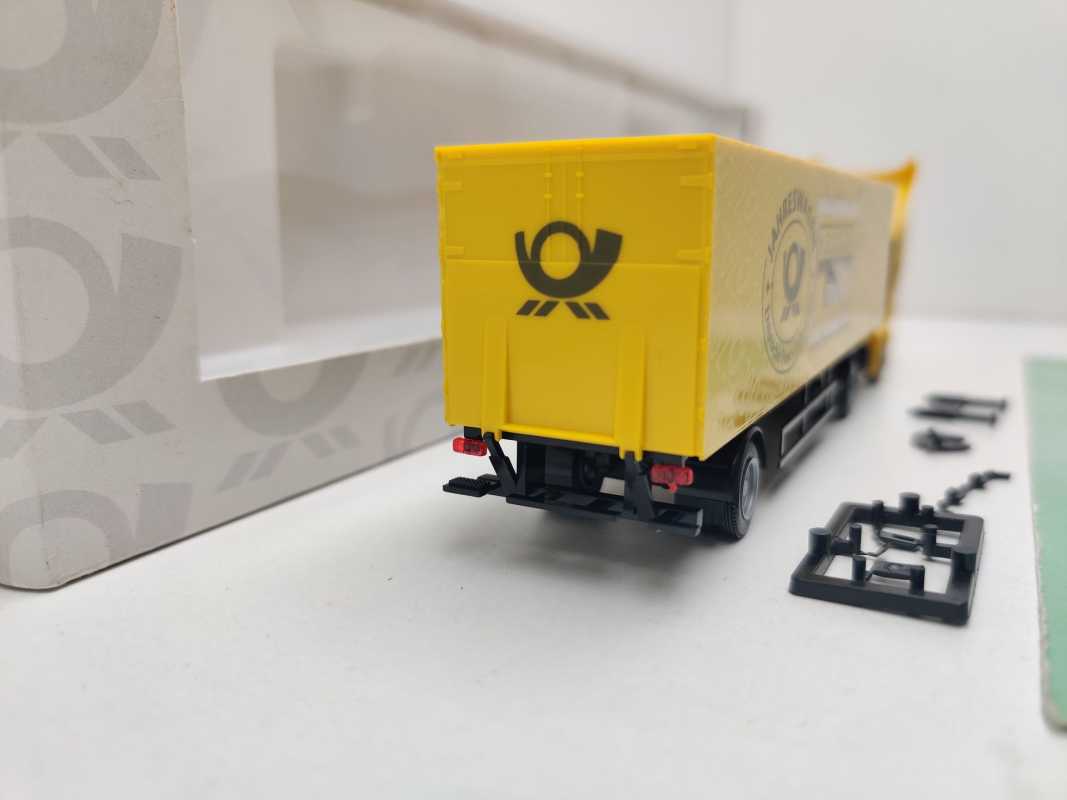 AWM H0 006734 MAN Sattelzug Deutsche Post Jahreswagen'02 / 1:87 / OVP