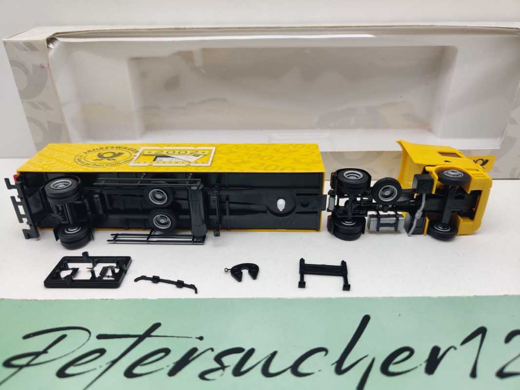 AWM H0 006734 MAN Sattelzug Deutsche Post Jahreswagen'02 / 1:87 / OVP