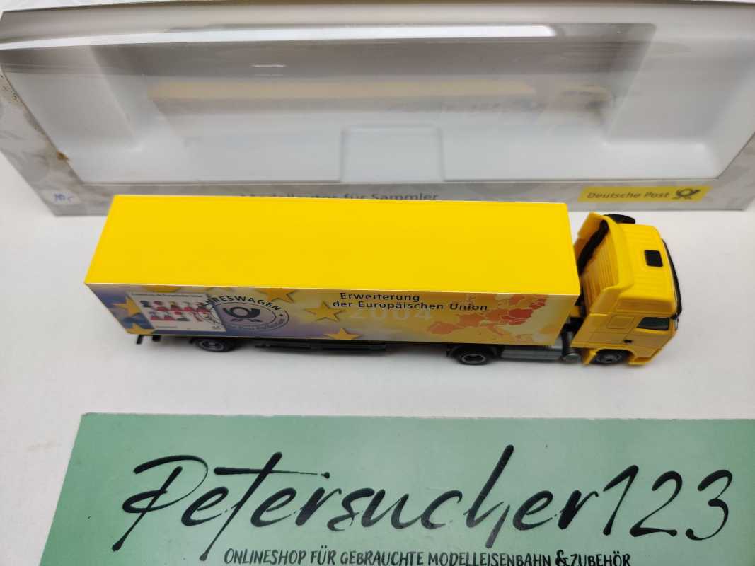 AWM H0 010499 Volvo Globetrotter Deutsche Post Jahreswg'04 / 1:87 / OVP