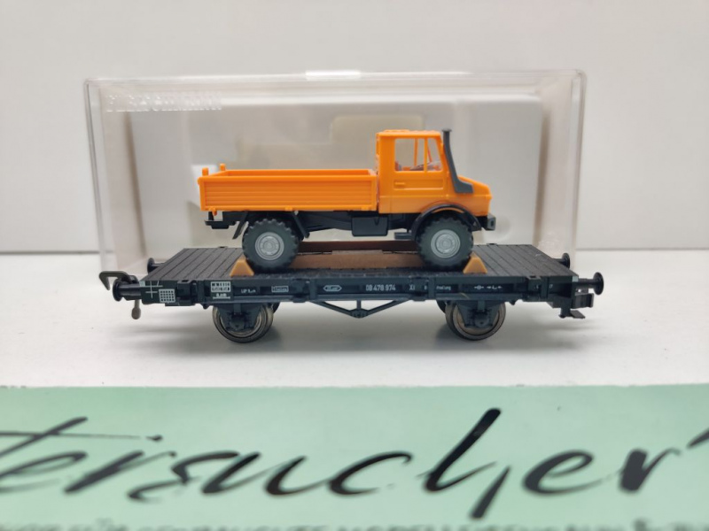 Fleischmann H0 DC 5218 Flachwagen "Unimog" Xf19 / NEM / DB / OVP