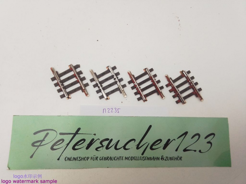 Märklin H0 AC 2235 4x gebogenes K-Gleis / R 424,6 / 3° 45'= 1/8 / Kleber, Farbe