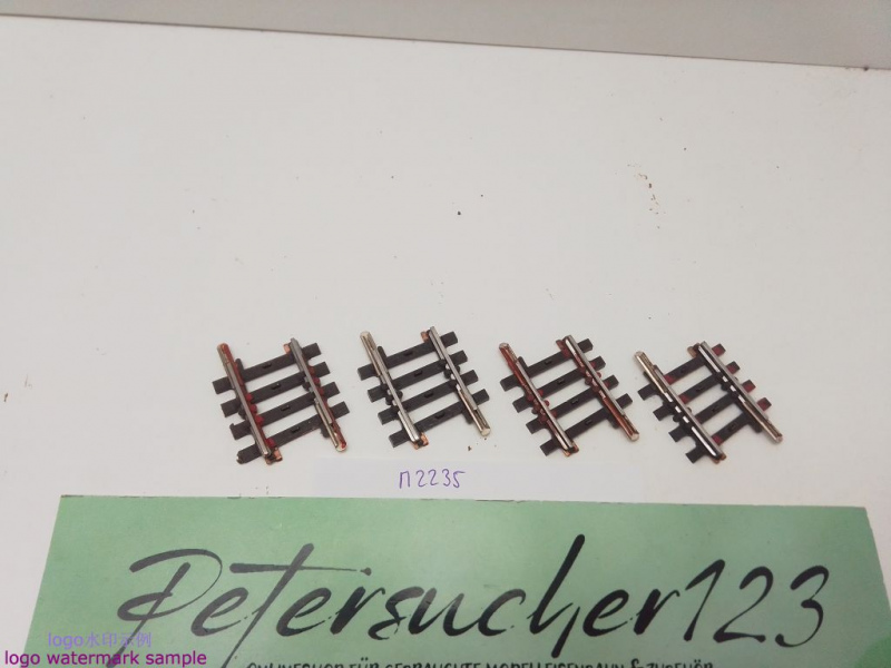 Märklin H0 AC 2235 4x gebogenes K-Gleis / R 424,6 / 3° 45'= 1/8 / Kleber, Farbe