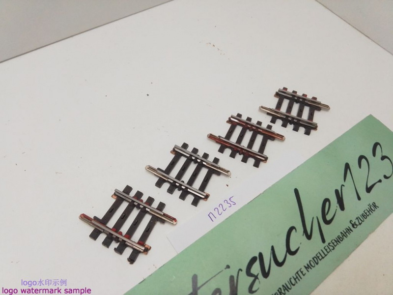 Märklin H0 AC 2235 4x gebogenes K-Gleis / R 424,6 / 3° 45'= 1/8 / Kleber, Farbe