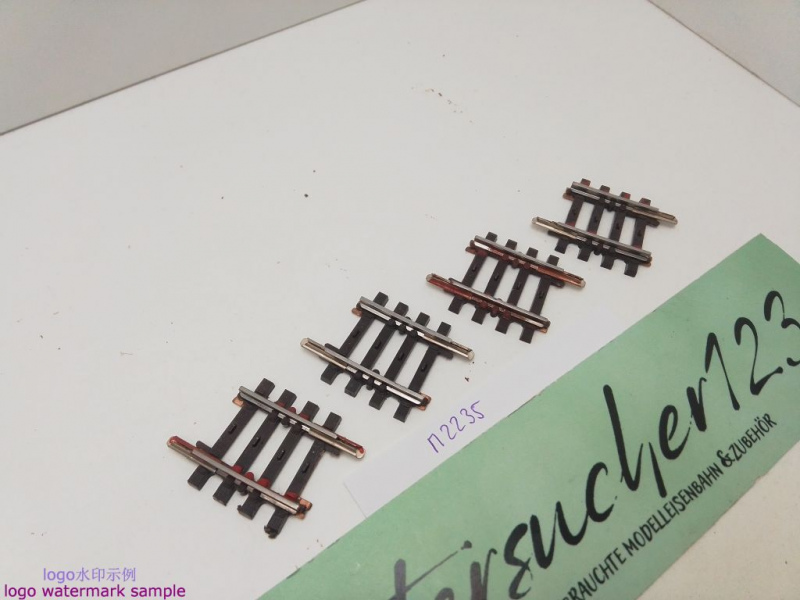 Märklin H0 AC 2235 4x gebogenes K-Gleis / R 424,6 / 3° 45'= 1/8 / Kleber, Farbe