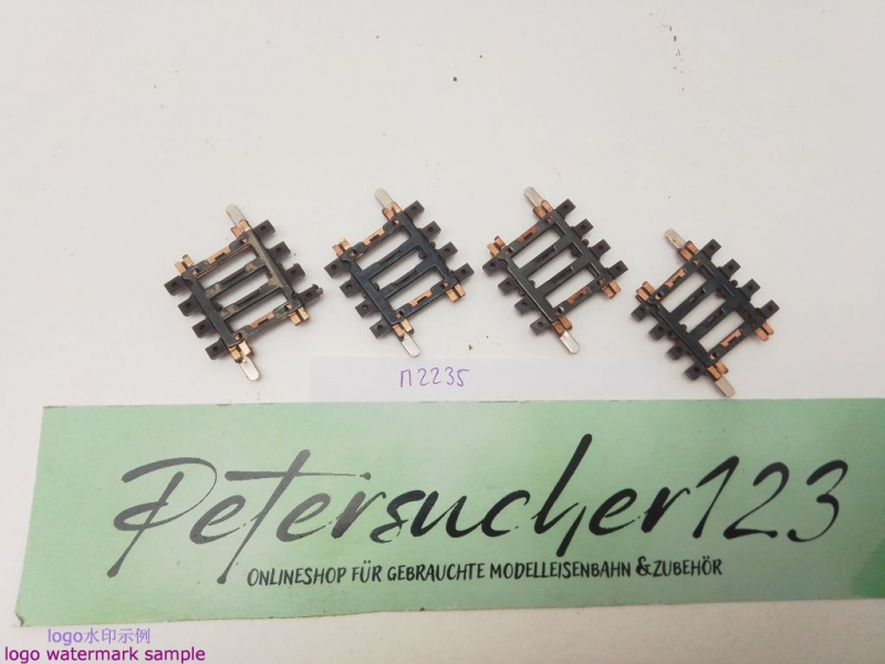 Märklin H0 AC 2235 4x gebogenes K-Gleis / R 424,6 / 3° 45'= 1/8 / Kleber, Farbe