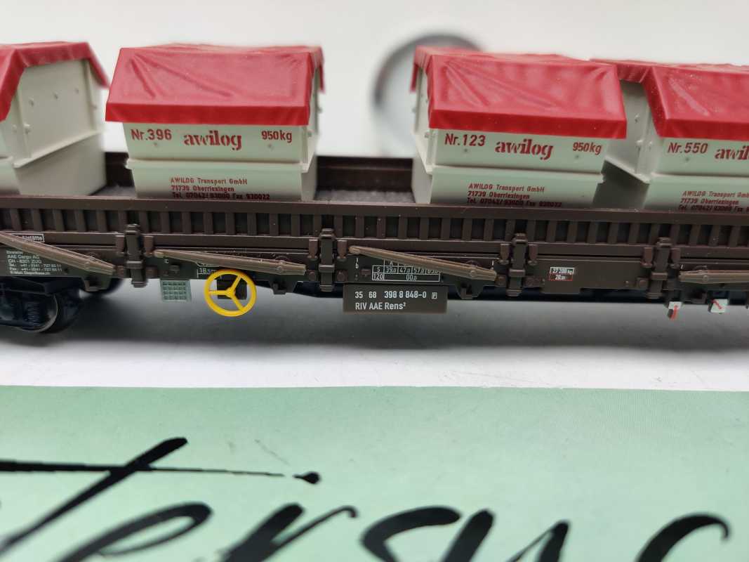 Märklin H0 AC 47086 vierachsigen Niederbordwagen der Bauart Rens 2 mit umklappbaren Rungen