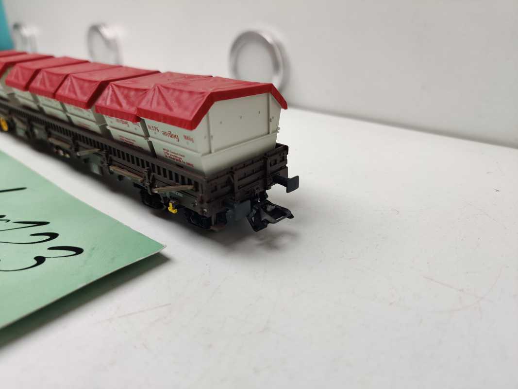 Märklin H0 AC 47086 vierachsigen Niederbordwagen der Bauart Rens 2 mit umklappbaren Rungen