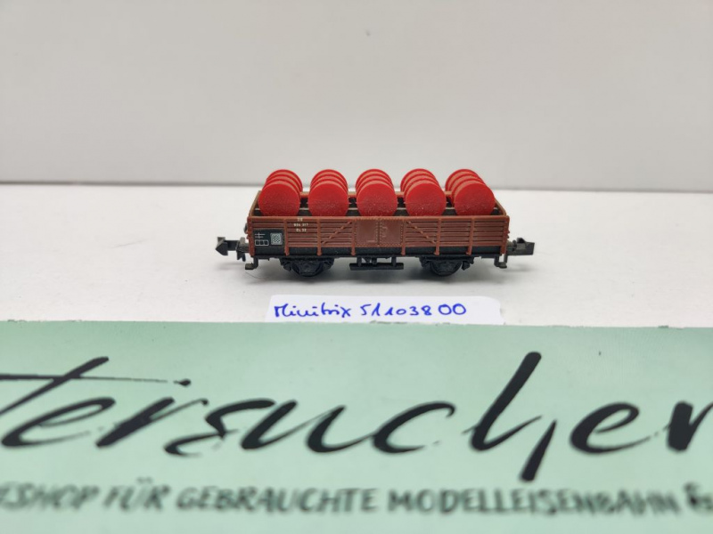 Minitrix N DC 51 1038 00 Mittelbordwagen / rote Fässer / Omm32 / DB