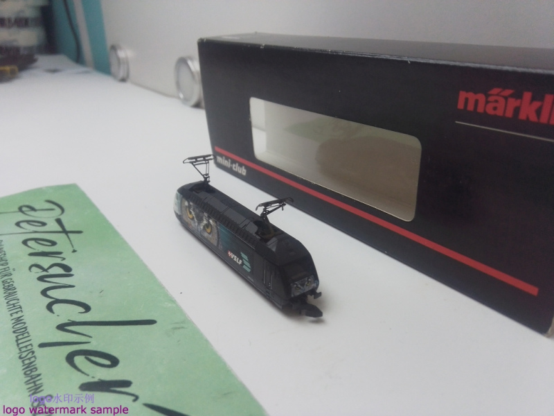 Märklin Z DC 88467 / Re 460 Elektrolokomotive / ist eine farbenfrohe Werbelokomotive /SBB / Digital-Umbau / OVP 