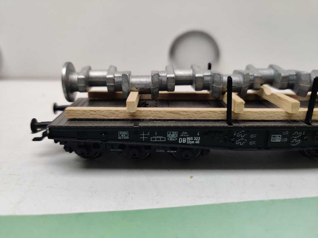 Märklin H0 AC 48675 / 965 323 / 6-Achser Schwerlastwagen / mit Ladegut Welle / NEM / DB