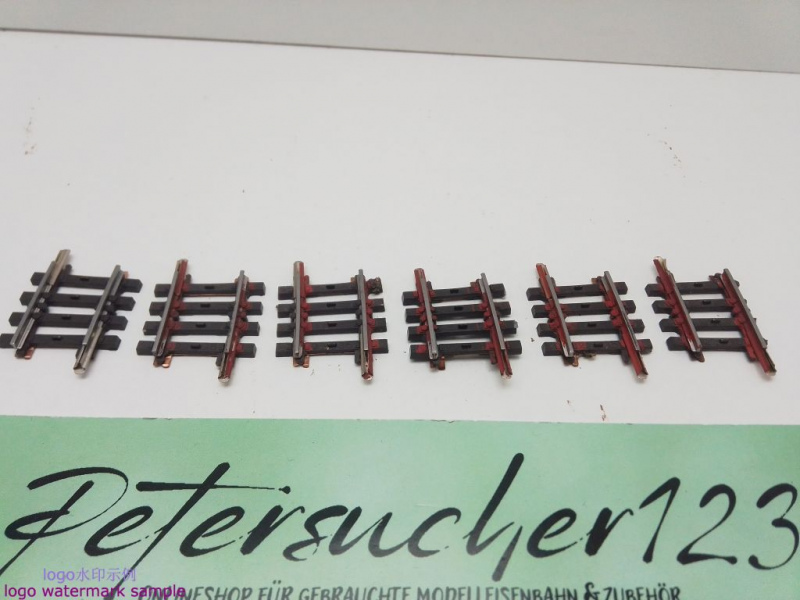 Märklin H0 AC 2235 5x gebogenes K-Gleis / R 424,6 / 3° 45'= 1/8 / Kleber, Farbe