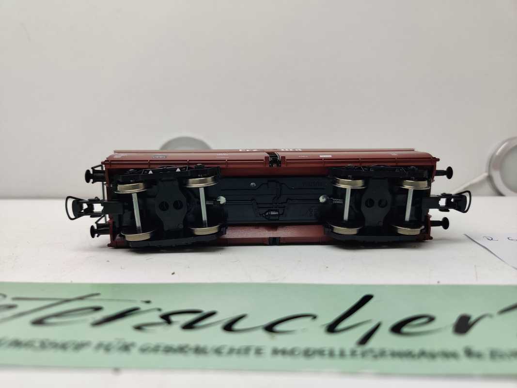 Roco H0 AC 610 591 / vierachsiger Großraum-Selbstentladewagen / NEM / DB / Ladegut Kohle