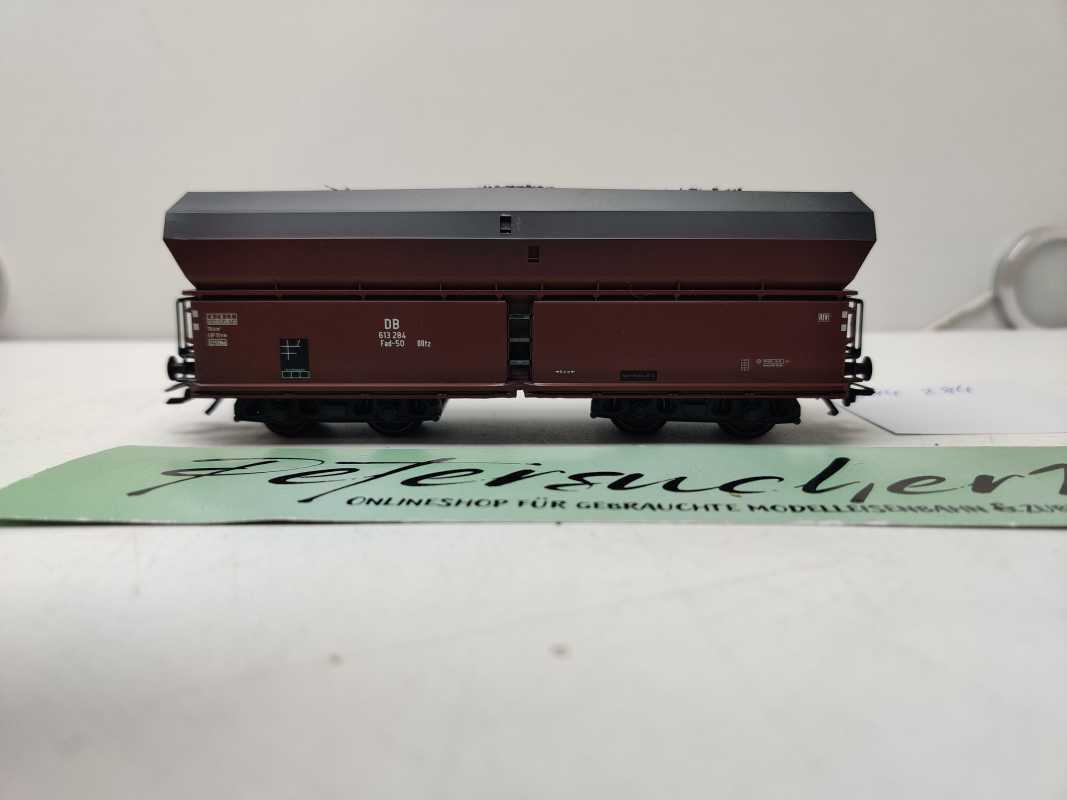 Roco H0 AC 614 284 / vierachsiger Großraum-Selbstentladewagen / NEM / DB / Ladegut Kohle