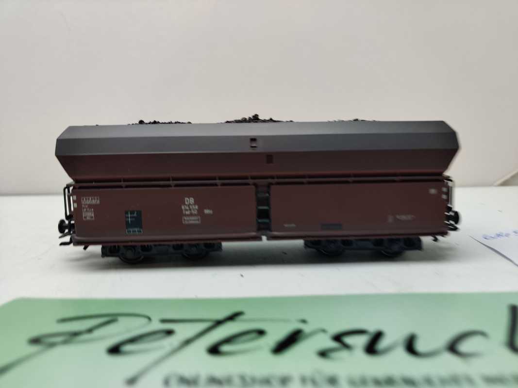 Roco H0 AC 614 558 / vierachsiger Großraum-Selbstentladewagen / NEM / DB / Ladegut Kohle