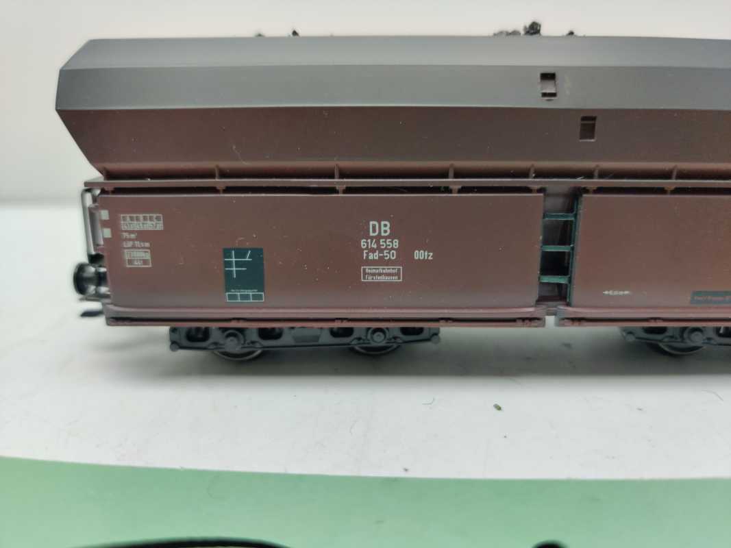 Roco H0 AC 614 558 / vierachsiger Großraum-Selbstentladewagen / NEM / DB / Ladegut Kohle