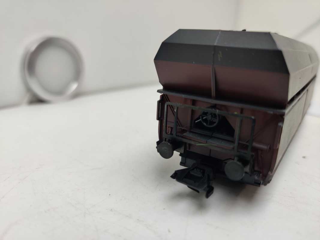 Roco H0 AC 614 558 / vierachsiger Großraum-Selbstentladewagen / NEM / DB / Ladegut Kohle
