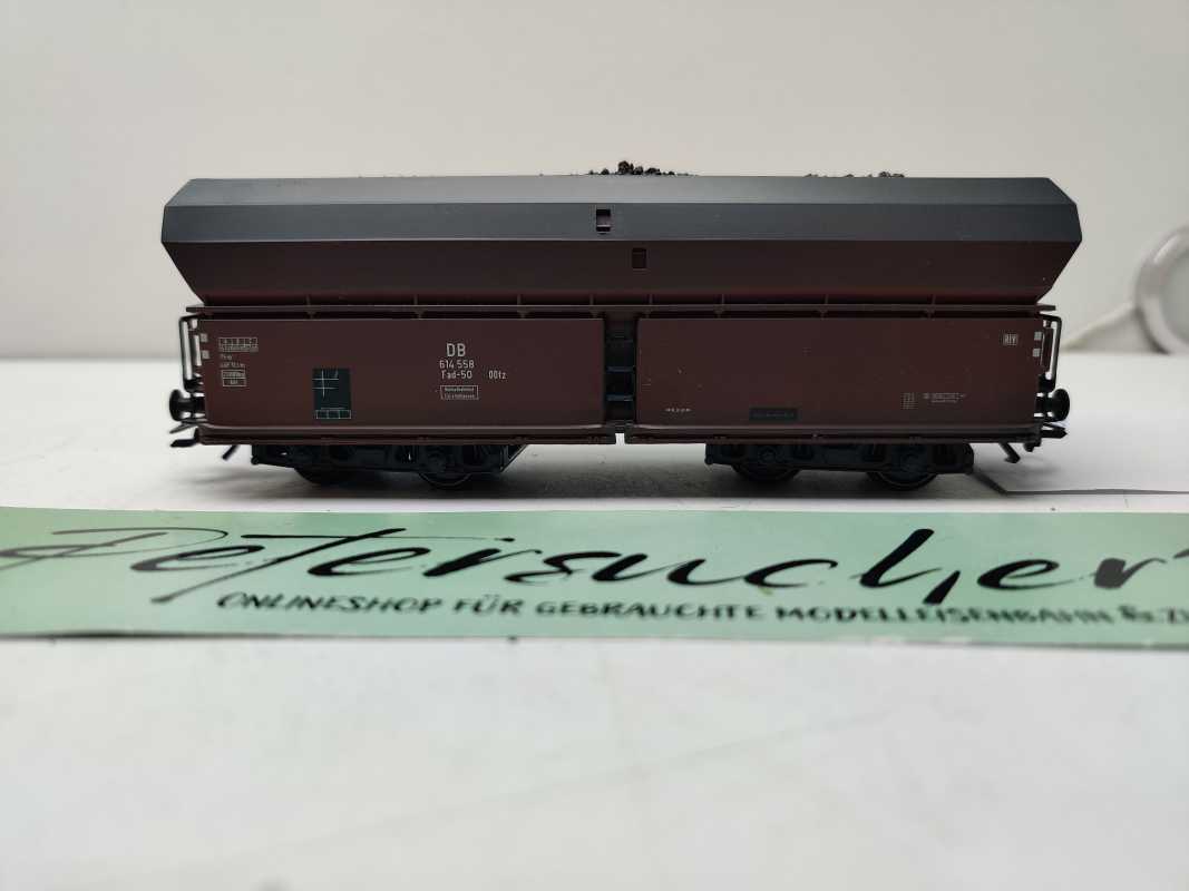 Roco H0 AC 614 558 / vierachsiger Großraum-Selbstentladewagen / NEM / DB / Ladegut Kohle