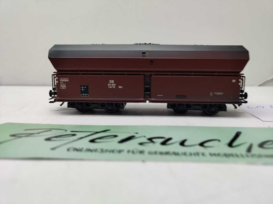 Roco H0 AC 614 669 / vierachsiger Großraum-Selbstentladewagen / NEM / DB / Ladegut Kohle