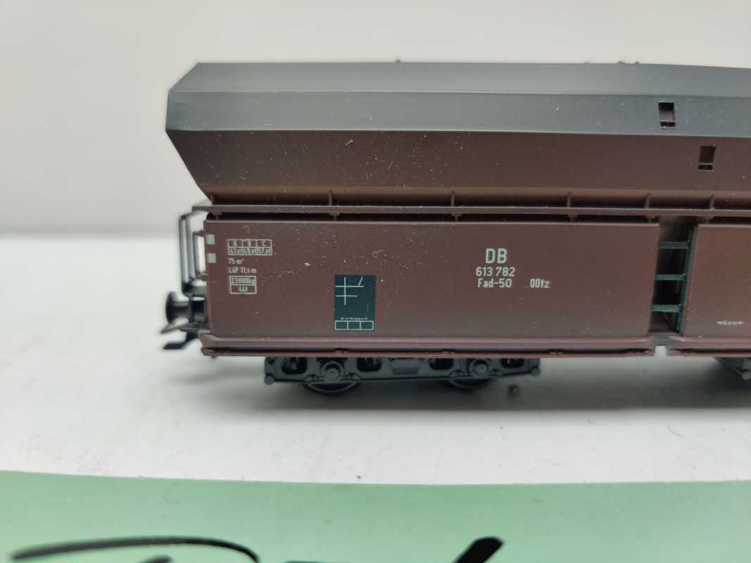 Roco H0 AC 614 782 / vierachsiger Großraum-Selbstentladewagen / NEM / DB / Ladegut Kohle